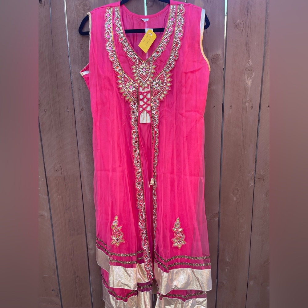 Bright pink Indian anarkali style suit